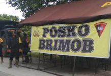 Brimob Polda Sumut Bantu Korban Banjir di Tebing Tinggi