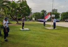 Bhabinkamtbmas Polsek Tumijajar Pimpin Upacara